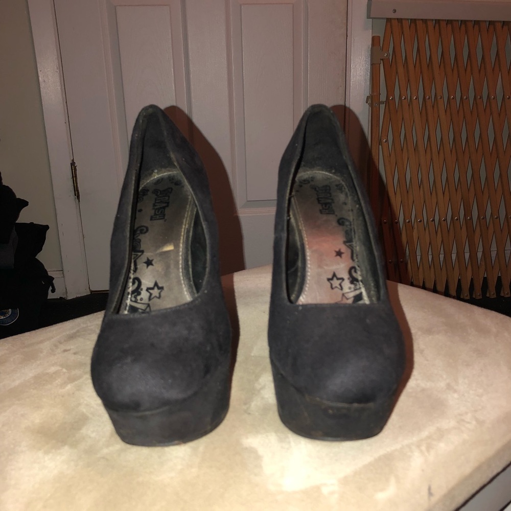 Black wedges.